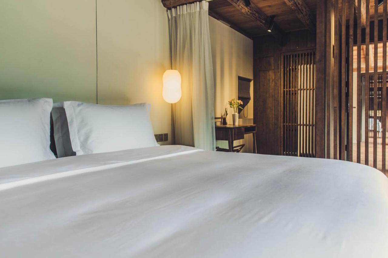 Tsingpu Tulou Retreat Hotel Zhangzhou ภายนอก รูปภาพ