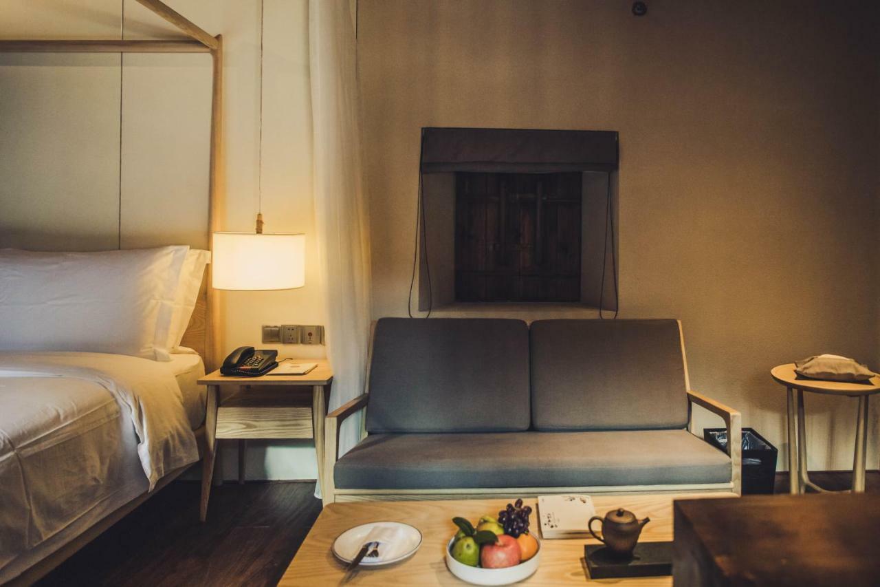 Tsingpu Tulou Retreat Hotel Zhangzhou ภายนอก รูปภาพ